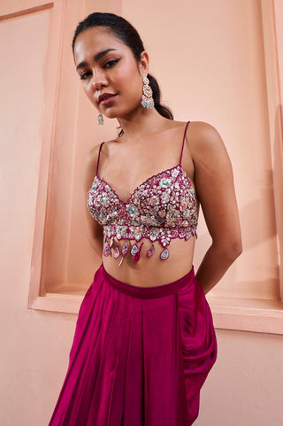 Close-up of sangria plum beaded bralette with teardrop tassels and pleated skirt by Osaa by Adarsh at Mrs. G