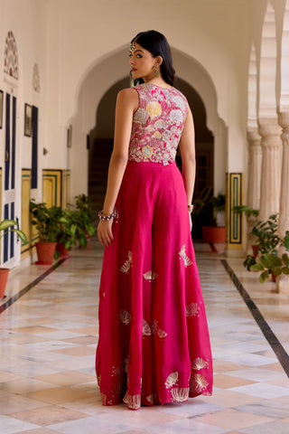 Back view of cut ruby embroidered top and flared sharara with motifs at the hem by Osaa by Adarsh at Mrs. G