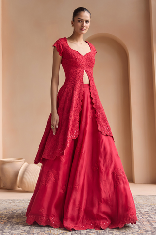 Front view of rosewood red open-front jacket and flared skirt set with scalloped hems by Osaa by Adarsh at Mrs. G