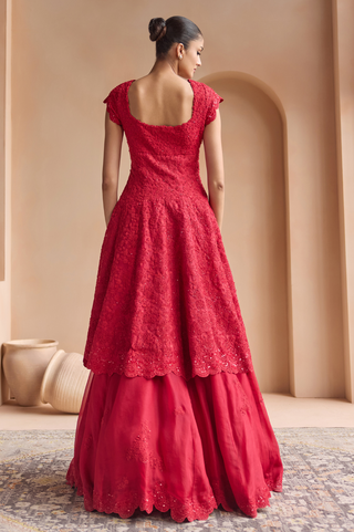 Back view of rosewood red jacket with square back neckline and flared skirt with sequin hem by Osaa by Adarsh at Mrs. G