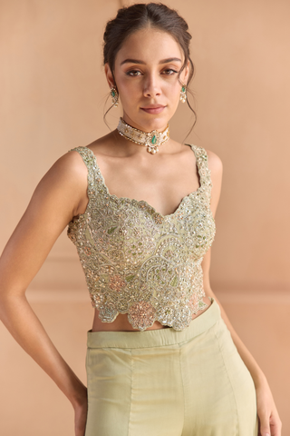 Close-up of sage top with scalloped sweetheart neckline, zardozi and peach flower embroidery by Osaa by Adarsh at Mrs. G