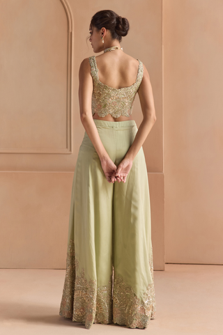 Back view of sage top with scoop back and garara with embroidered hem border by Osaa by Adarsh at Mrs. G