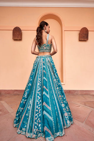 Back view of pine green lehenga with strappy blouse and vertical embroidered panels by Osaa by Adarsh at Mrs. G