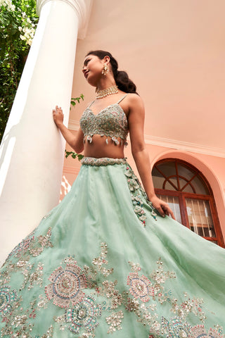 Close-up of cadet blue flared lehenga skirt with floral medallion embroidery by Osaa by Adarsh at Mrs. G