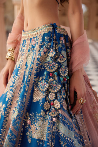 Close-up of blueberry lehenga waistband with fan medallion latkan and applique panels by Osaa by Adarsh at Mrs. G