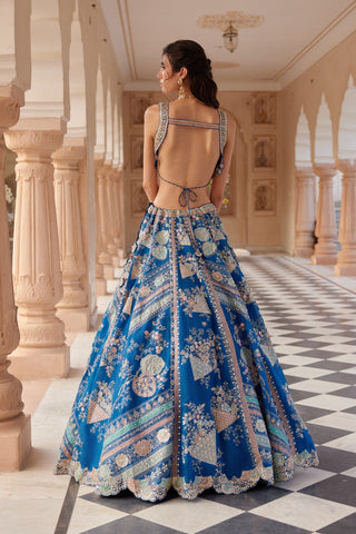 Back view of blueberry applique lehenga with strappy bralette and applique patchwork skirt by Osaa by Adarsh at Mrs. G