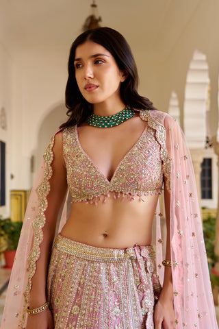 Close view of rosaline pink V-neck blouse with zardozi and pink bead tassels by Osaa by Adarsh at Mrs. G