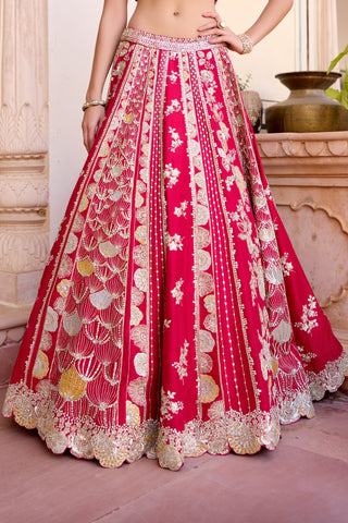 Front view of cut ruby lehenga skirt with vertical zardozi panels and a scalloped border by Osaa by Adarsh at Mrs. G