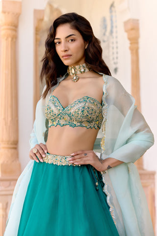 Waist-up view of pine green sweetheart-neck blouse with zardozi fans and aqua dupatta by Osaa by Adarsh at Mrs. G