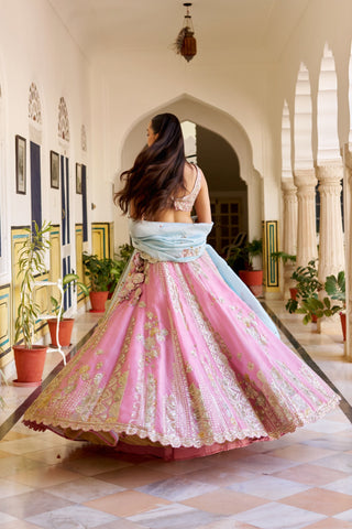 Back view of rosaline pink lehenga with a flared skirt and scalloped gold hem by Osaa by Adarsh at Mrs. G