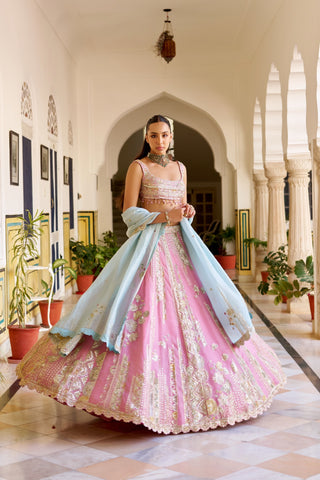 Three-quarter view of rosaline pink lehenga with powder blue dupatta and scalloped gold hem by Osaa by Adarsh at Mrs. G