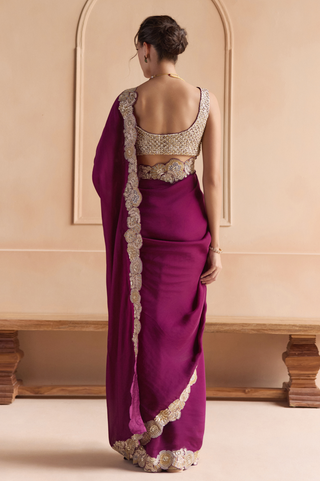 Back view of aubergine saree with flower border along the pallu and scoop back blouse by Osaa by Adarsh at Mrs. G