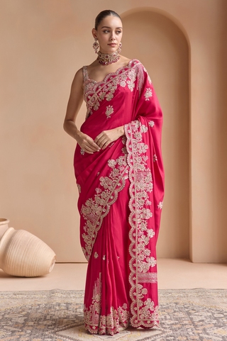 Front view of chilli red saree with scalloped zardozi flower border and sweetheart blouse by Osaa by Adarsh at Mrs. G