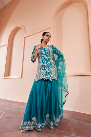 Front view of pine green embroidered short kurta with flared sharara and net dupatta by Osaa by Adarsh at Mrs. G