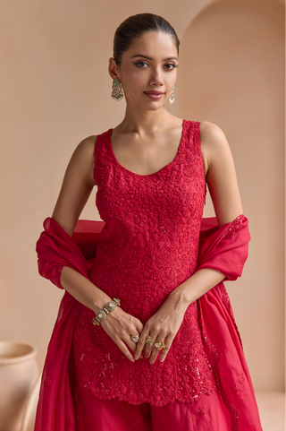 Waist-up view of rosewood red sleeveless scoop neck kurta with tone on tone thread embroidery and sequins by Osaa by Adarsh at Mrs. G