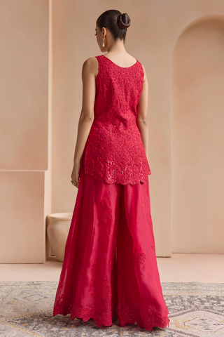 Back view of rosewood red embroidered kurta with scalloped hem and wide sharara by Osaa by Adarsh at Mrs. G
