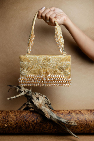 Gold ornate radiance kasse bag