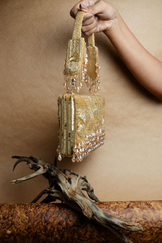 Gold ornate radiance kasse bag