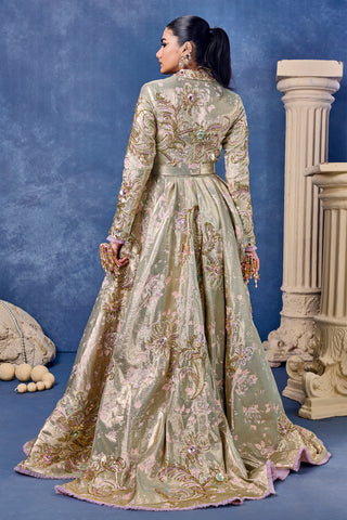 Back view of the sage green jacket gown with a trailing skirt at Mrs. G