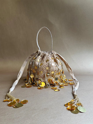 Gold mirror-embellished potli with tassel details