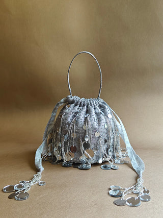 Silver festive mirror-embellished potli with tassels