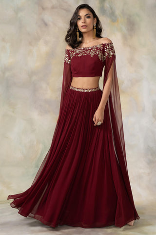 Maroon off shouldered cape sleeve crop top and skirt set