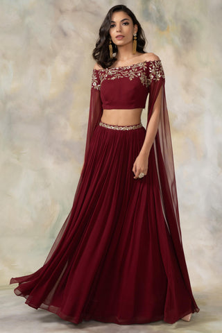 Maroon off shouldered cape sleeve crop top and skirt set