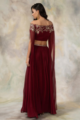 Maroon off shouldered cape sleeve crop top and skirt set