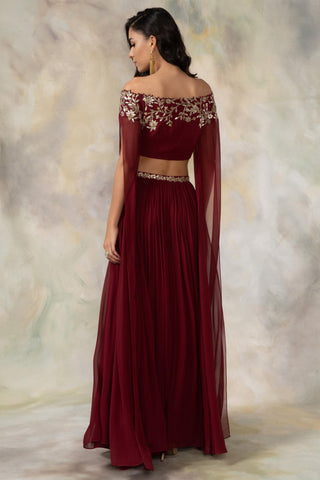 Maroon off shouldered cape sleeve crop top and skirt set