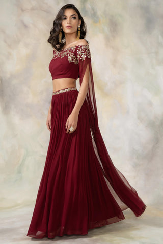 Maroon off shouldered cape sleeve crop top and skirt set