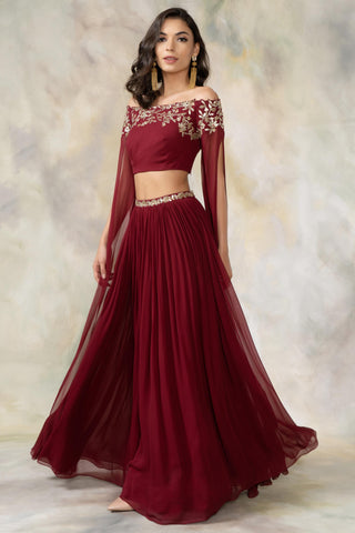 Maroon off shouldered cape sleeve crop top and skirt set