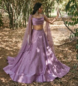 Purple draped blouse and lehanga set