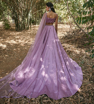 Purple draped blouse and lehanga set
