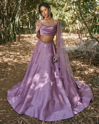 Purple draped blouse and lehanga set
