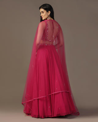 Bright pink draped blouse and lehenga set