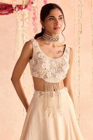 Ivory primrose under bloom lehenga set