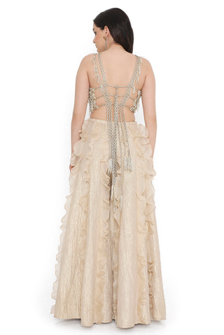 Offwhite embroidered choli and gold tissue frill sharara