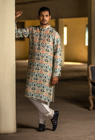 Cream printed silk kurta and churidar