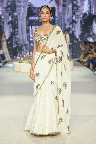 Ivory choli with embroidered saree