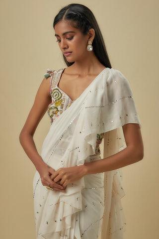 Off-white choli with saree and attached belt