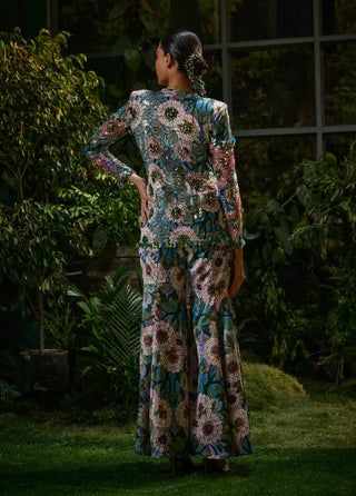 Teal blue peplum top and flared pants