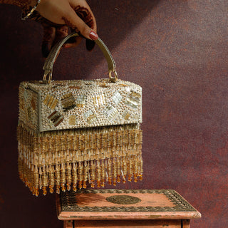 Gold rizuana clutch