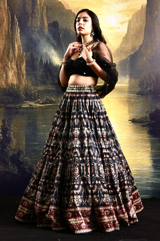Black printed suede lehenga with a pleated embroidered blouse
