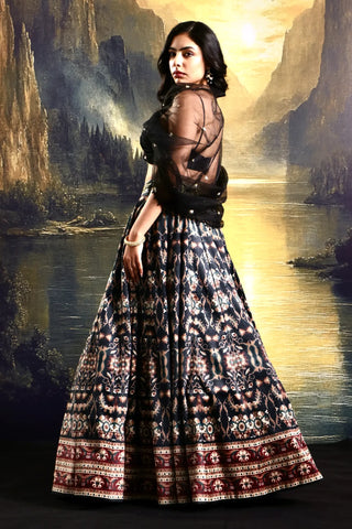 Black printed suede lehenga with a pleated embroidered blouse