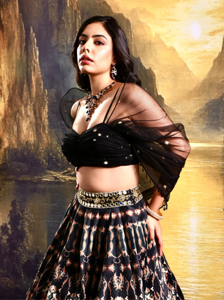 Black printed suede lehenga with a pleated embroidered blouse