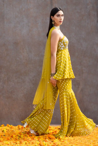 Lemon green peplum and flared pant set