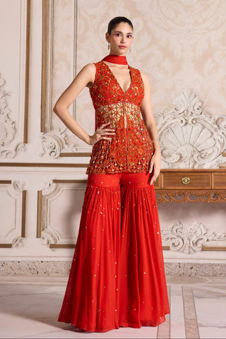 Peplum Sharara Set for Indian Weddings – Orange Cutwork Ensemble by Sanya Gulati