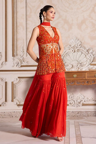 Peplum Sharara Set for Indian Weddings – Orange Cutwork Ensemble by Sanya Gulati
