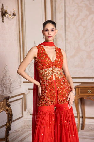 Peplum Sharara Set for Indian Weddings – Orange Cutwork Ensemble by Sanya Gulati