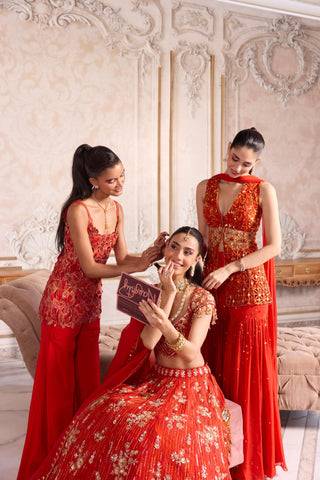 Peplum Sharara Set for Indian Weddings – Orange Cutwork Ensemble by Sanya Gulati
